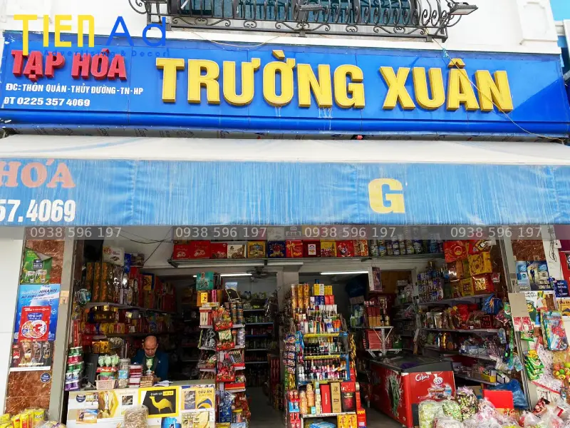 Mẫu biển quảng cáo cửa hàng tạp hóa Trường Xuân
