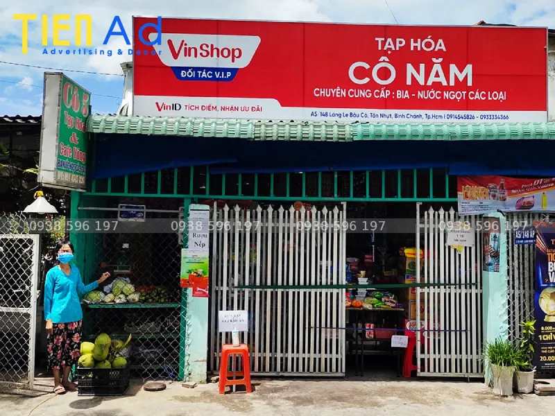 mẫu bảng hiệu cửa hàng tạp hóa tài trợ hàng Vinshop